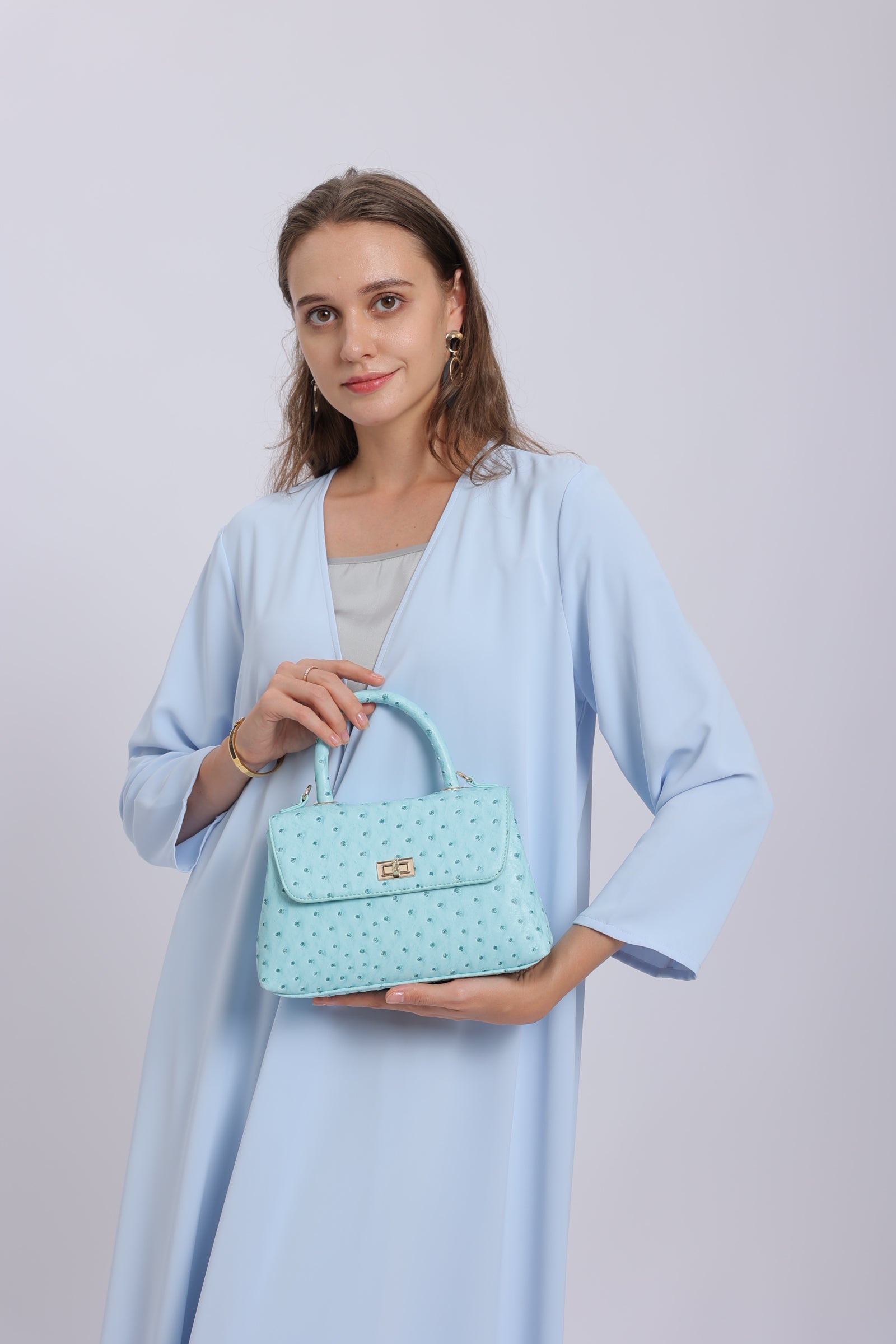 حقيبة كلاسيكية بمقبض - باللون الازرق