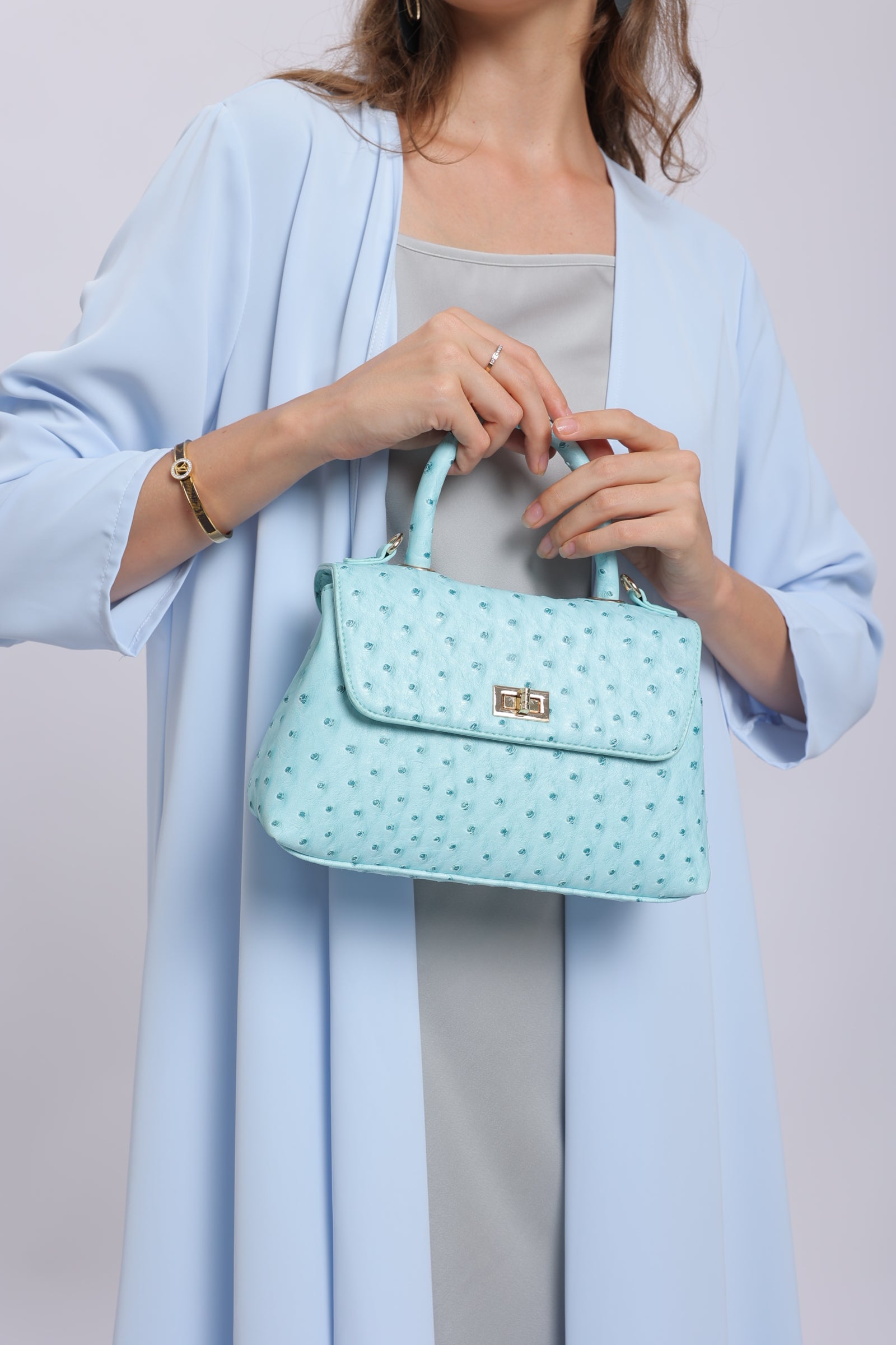 حقيبة كلاسيكية بمقبض - باللون الازرق