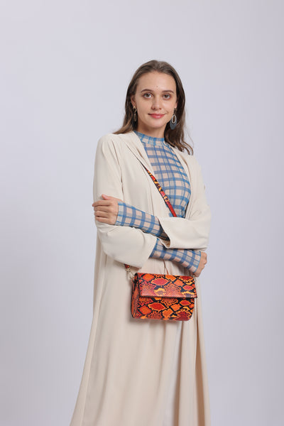 Mini Clutch with Crossbody Strap in Orange